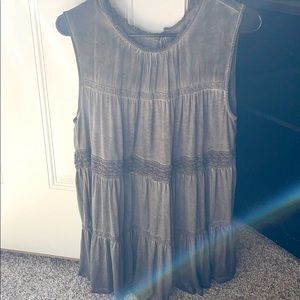 Grey tank with lace detail.